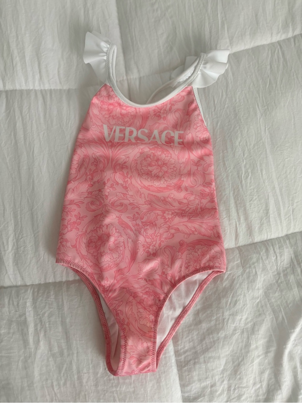 Versace Pink Baroque Logo One-Piece Swimsuit with White Ruffle Straps. Worn once